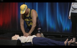 Performing CPR in the Paris show of The Legend of L Inconnue